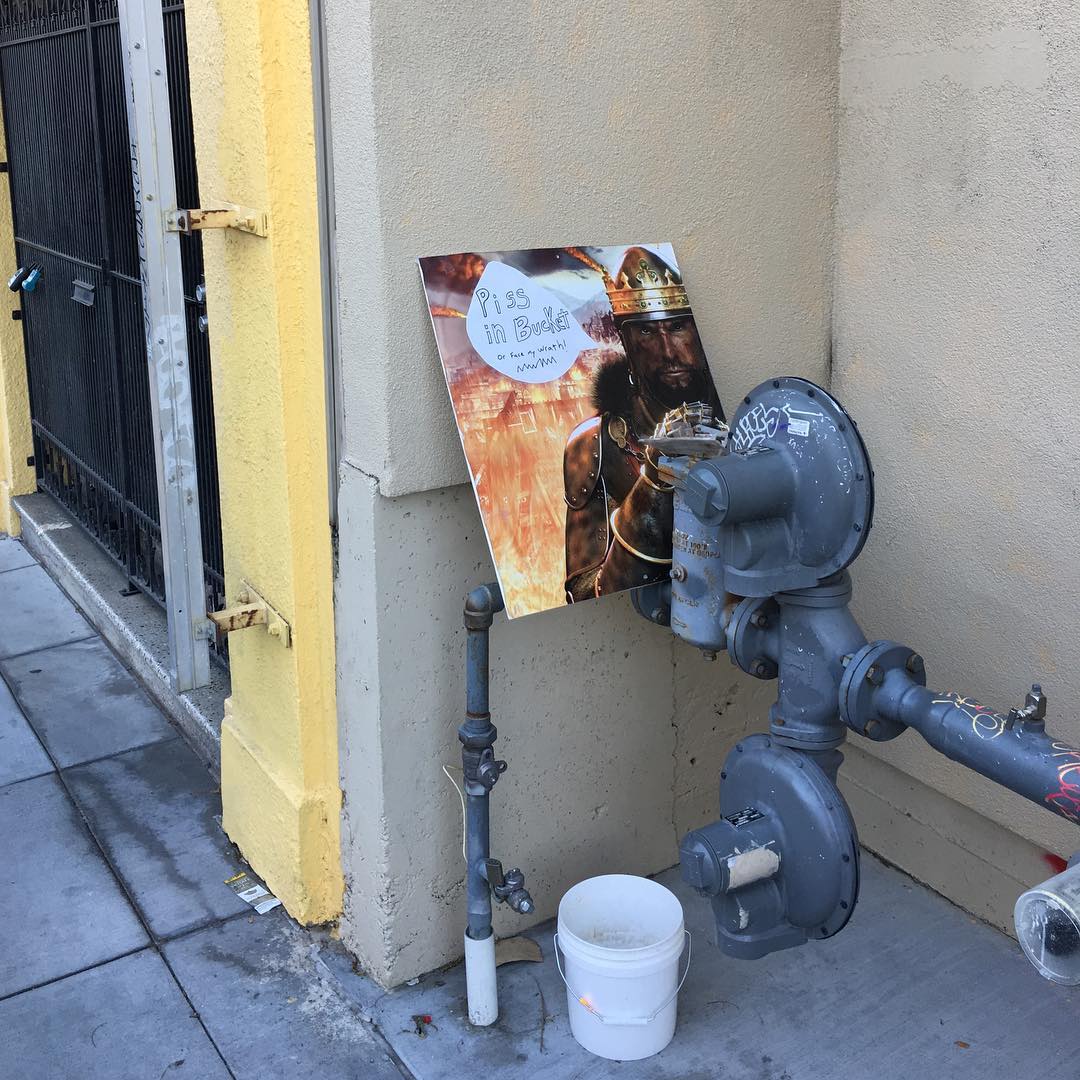 Just another day in the Mission. The sign says: “Piss in the bucket or face my wrath.” Also, my Sega days seem to be haunting me